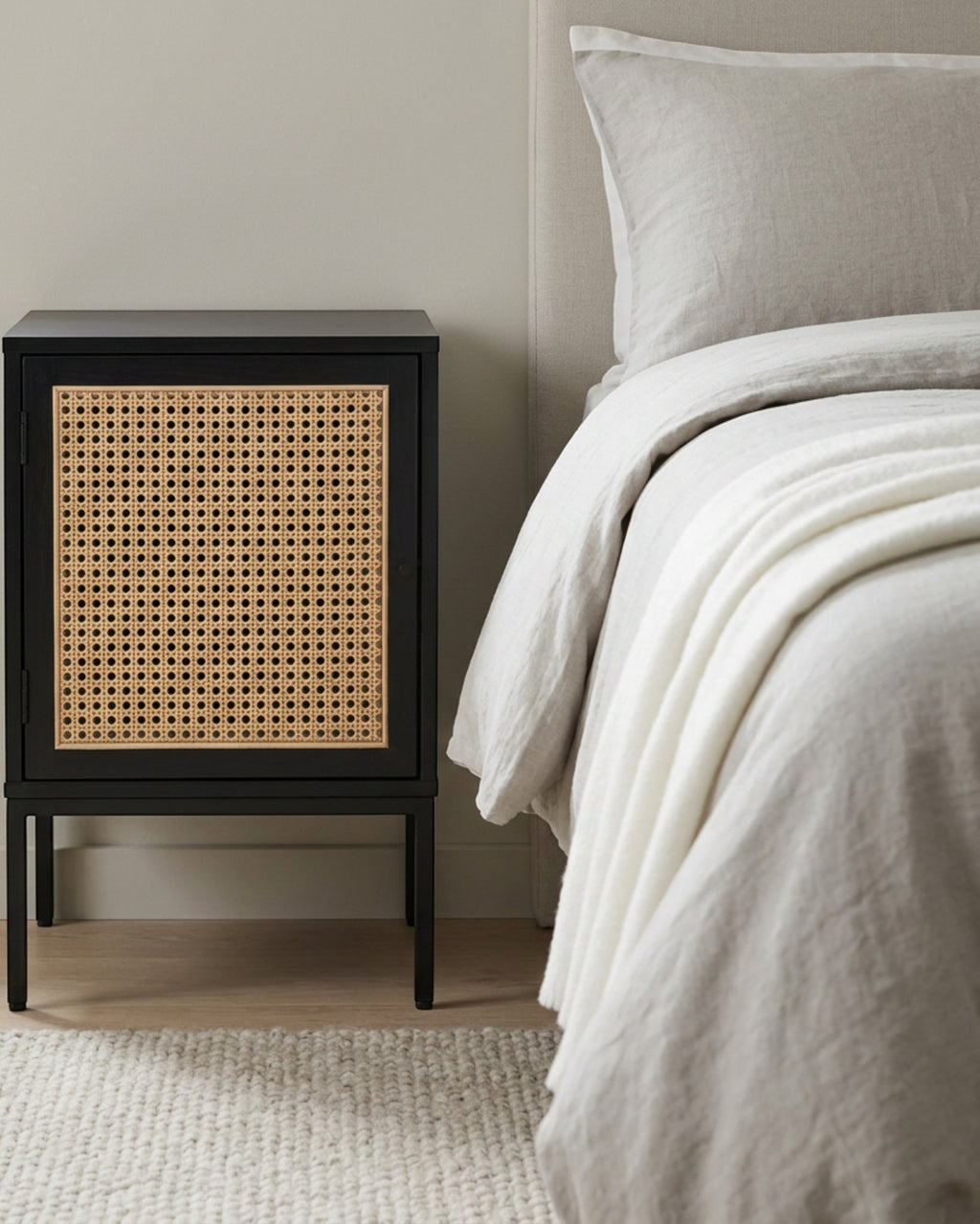 Gavro Cane Door Bedside Cabinet Black Natural - Lifestyle view