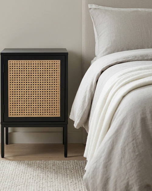 Gavro Cane Door Bedside Cabinet Black Natural - Lifestyle view